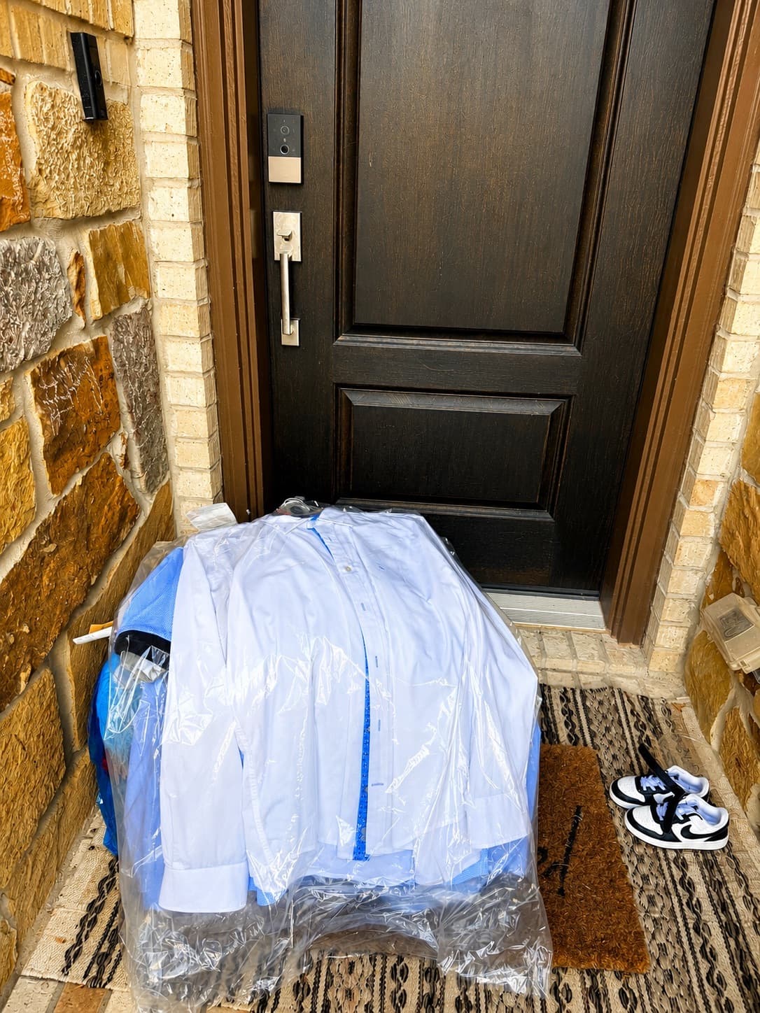 Freshly dry-cleaned shirts delivered back to a customer's front door