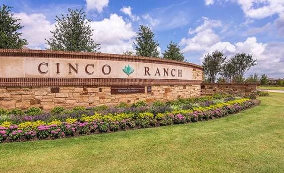 Cinco Ranch community entrance monument sign surrounded by landscaping